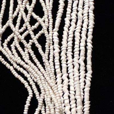 Two beaded white necklaces