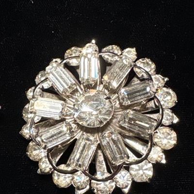 Two rhinestone brooches
