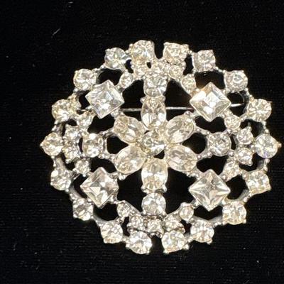 Two rhinestone brooches