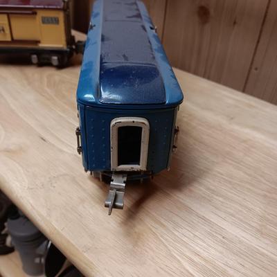 LIONEL BLUE COMET PASSENGER TRAIN, SUNOCO TANK CAR, A BOXCAR, RAILROAD LIGHT AND NO CROSSING