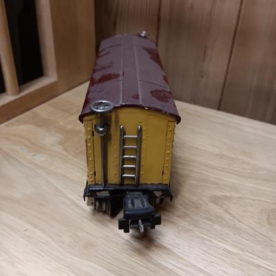 LIONEL BLUE COMET PASSENGER TRAIN, SUNOCO TANK CAR, A BOXCAR, RAILROAD LIGHT AND NO CROSSING