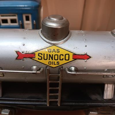 LIONEL BLUE COMET PASSENGER TRAIN, SUNOCO TANK CAR, A BOXCAR, RAILROAD LIGHT AND NO CROSSING