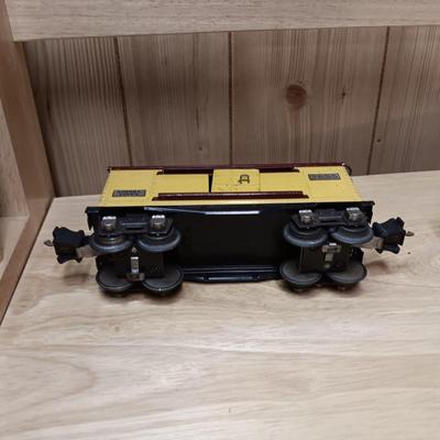 LIONEL BLUE COMET PASSENGER TRAIN, SUNOCO TANK CAR, A BOXCAR, RAILROAD LIGHT AND NO CROSSING