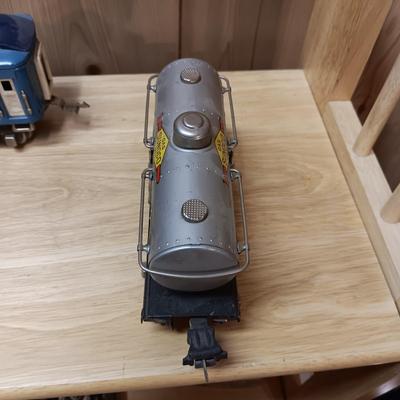 LIONEL BLUE COMET PASSENGER TRAIN, SUNOCO TANK CAR, A BOXCAR, RAILROAD LIGHT AND NO CROSSING