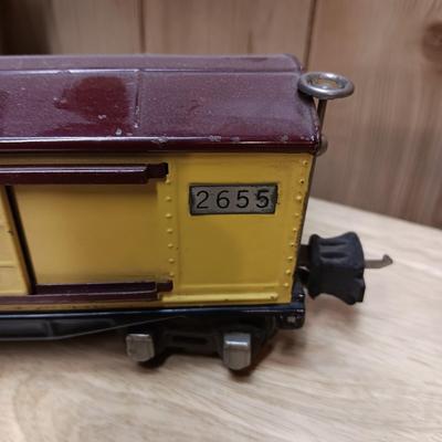 LIONEL BLUE COMET PASSENGER TRAIN, SUNOCO TANK CAR, A BOXCAR, RAILROAD LIGHT AND NO CROSSING