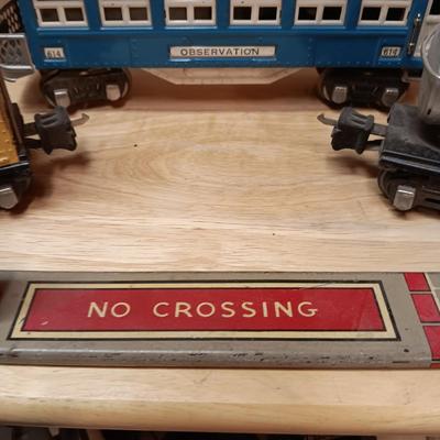 LIONEL BLUE COMET PASSENGER TRAIN, SUNOCO TANK CAR, A BOXCAR, RAILROAD LIGHT AND NO CROSSING