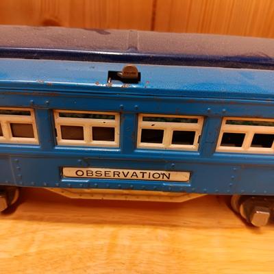 LIONEL BLUE COMET PASSENGER TRAIN, SUNOCO TANK CAR, A BOXCAR, RAILROAD LIGHT AND NO CROSSING