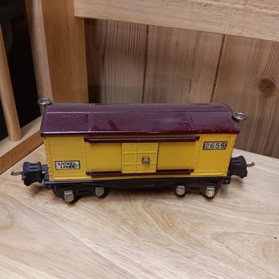 LIONEL BLUE COMET PASSENGER TRAIN, SUNOCO TANK CAR, A BOXCAR, RAILROAD LIGHT AND NO CROSSING