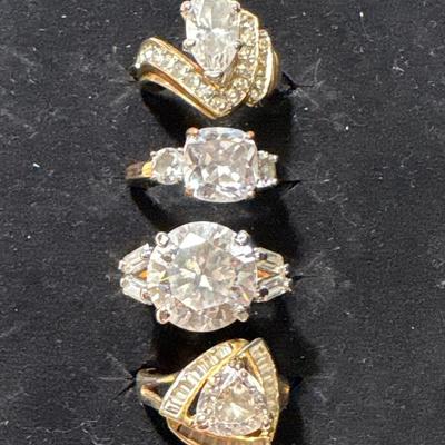 Four cocktail rings