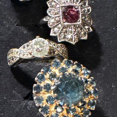 Four cocktail rings