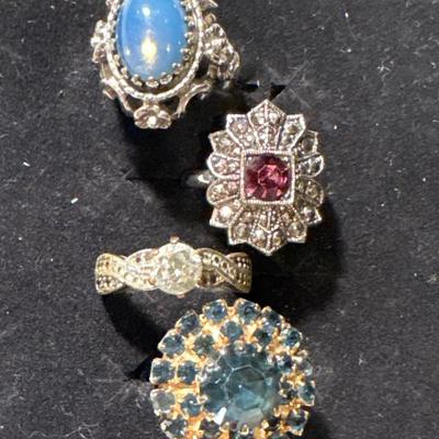 Four cocktail rings