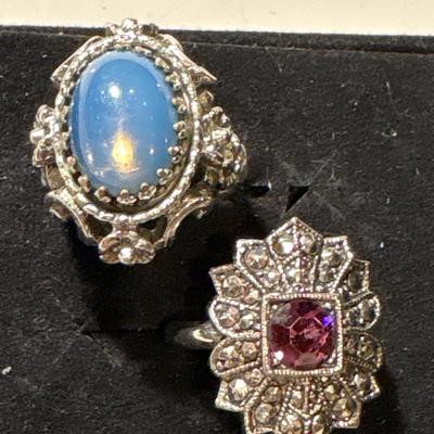 Four cocktail rings