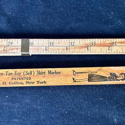 2 Vintage measuring sticks