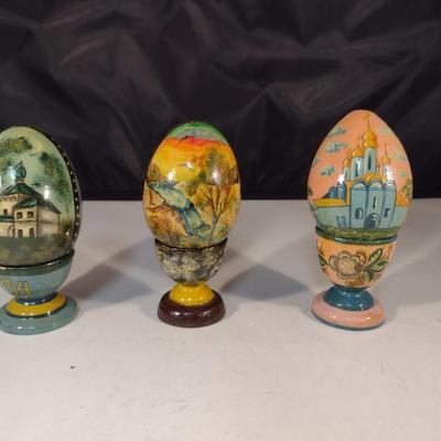 Collection of Hand Painted Russian Lacquer Eggs with Cup Stands- Three Pieces
