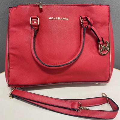 Red Michael Kors handbag