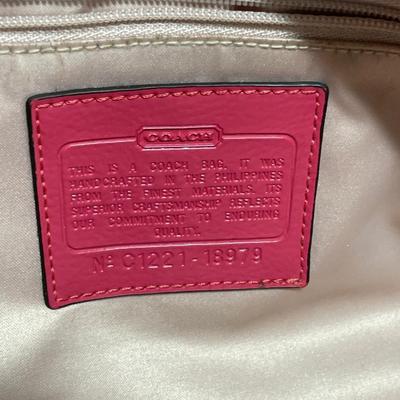 Red and cream Coach purse