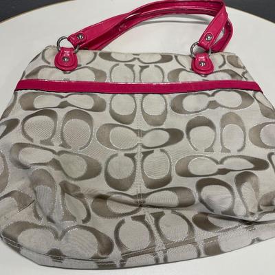 Red and cream Coach purse