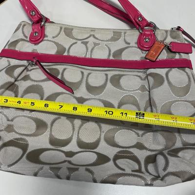 Red and cream Coach purse