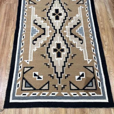 Sale Photo Thumbnail #80: 62” x 38” Navajo Native rug
Has stain in the corner