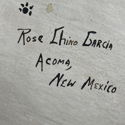 Sale Photo Thumbnail #84: Has chip
Signed by Rose Garcia