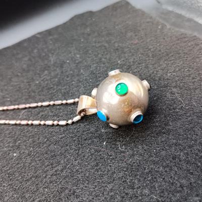 VERY UNIQUE NATIVE MADE STERLING SILVER ENCLOSED BELL ON A STERLING CHAIN