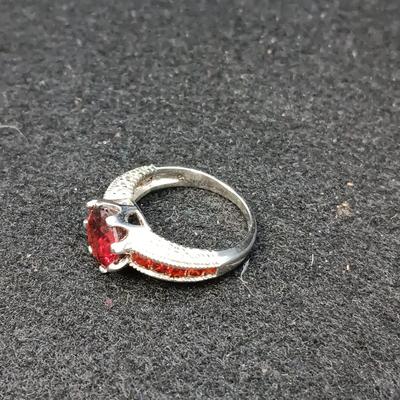 STERLING EARRINGS AND RING (SIZE 6 1/2) WITH RED STONES