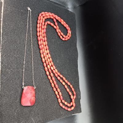 RED STONE ON STERLING CHAIN AND RED BEADED LONG NECKLACE