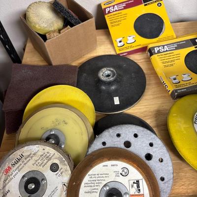 Dewalt sander & sandpaper in bucket