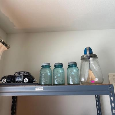 Ball jars and butter churn 
