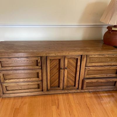 Sale Photo Thumbnail #443: 3 smaller drawers in the center behind two doors. Six larger drawers total on the sides. 19d x 29.5h x 75l