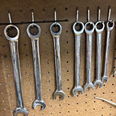 Clear wrench set, hammer, oil can
