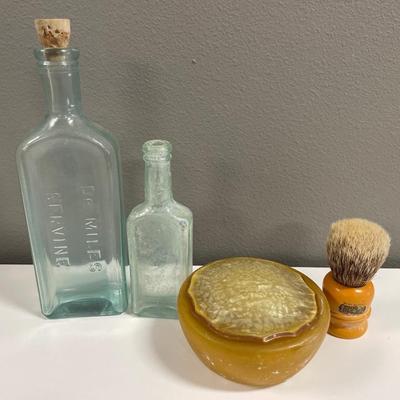 Sale Photo Thumbnail #140: Bottles and shaving items