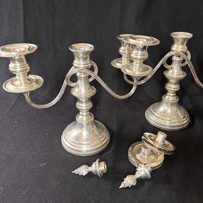 Pair of weighted candelabra - silver-plate