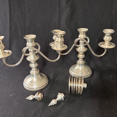 Pair of weighted candelabra - silver-plate