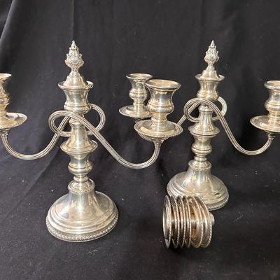 Pair of weighted candelabra - silver-plate