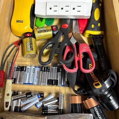 Stud finder, utility knife, batteries, flashlights