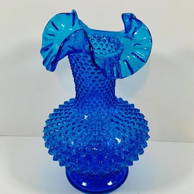 LOT 6: Collection of Blue Glass Vases Featuring Fenton Colonial Blue Hobnail Ruffle Top Vase and More