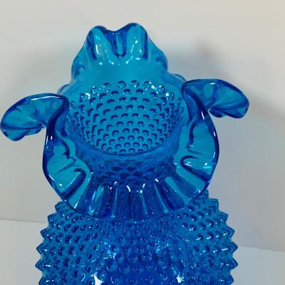 LOT 6: Collection of Blue Glass Vases Featuring Fenton Colonial Blue Hobnail Ruffle Top Vase and More