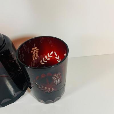 Lot 9: Bohemian Czech Amethyst Cut Glass Decanter and Tumbler and Red Art Glass Vases