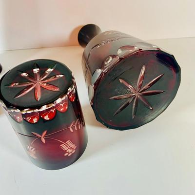 Lot 9: Bohemian Czech Amethyst Cut Glass Decanter and Tumbler and Red Art Glass Vases