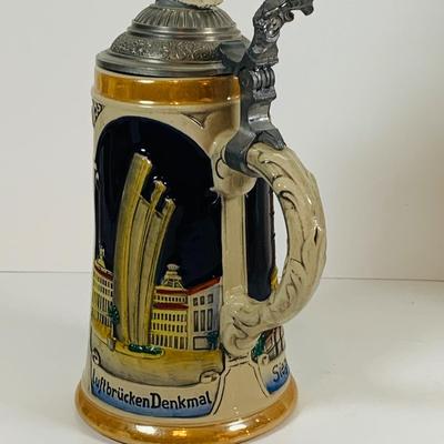 LOT 20: Collection of Beer Steins Including Berlin Wall Stein with a Piece of the Wall on The Lid