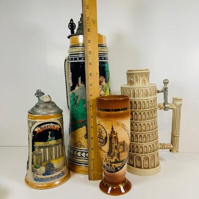 LOT 20: Collection of Beer Steins Including Berlin Wall Stein with a Piece of the Wall on The Lid