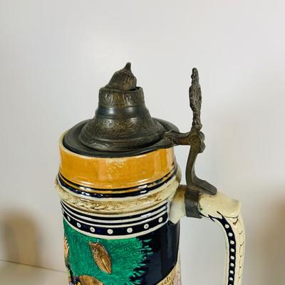 LOT 20: Collection of Beer Steins Including Berlin Wall Stein with a Piece of the Wall on The Lid