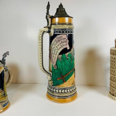 LOT 20: Collection of Beer Steins Including Berlin Wall Stein with a Piece of the Wall on The Lid