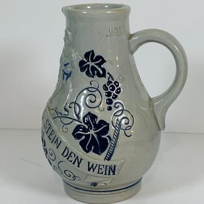 LOT 21: Assortment of Ceramic Mugs, Steins, and Bottles Featuring a Blue Delft Heineken Mug