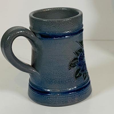 LOT 21: Assortment of Ceramic Mugs, Steins, and Bottles Featuring a Blue Delft Heineken Mug
