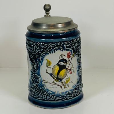LOT 21: Assortment of Ceramic Mugs, Steins, and Bottles Featuring a Blue Delft Heineken Mug