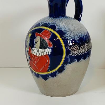 LOT 21: Assortment of Ceramic Mugs, Steins, and Bottles Featuring a Blue Delft Heineken Mug