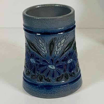 LOT 21: Assortment of Ceramic Mugs, Steins, and Bottles Featuring a Blue Delft Heineken Mug