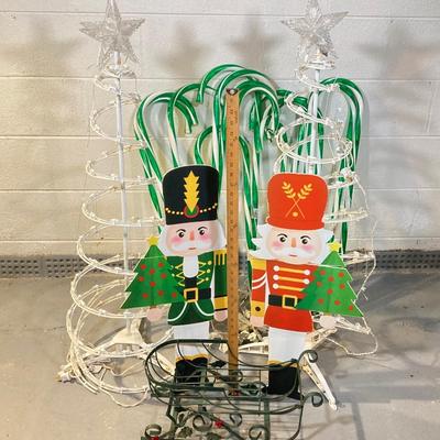 LOT 62: Inflatable Snowman, Lighted Rudolph, Lighted Candy Canes, Pair of Collapsible Lighted Christmas Trees